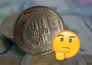 Esta es la razón por la que algunas monedas de un sol están manchadas de rojo